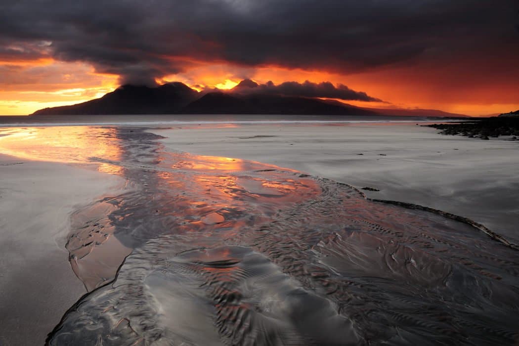 Sunset over Rum, Bay of Laig, Isle of Eigg - Karen Thorburn