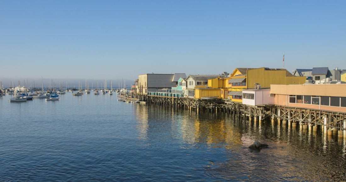 A view of Monterey's Fisherman's Wharf during golden hour.