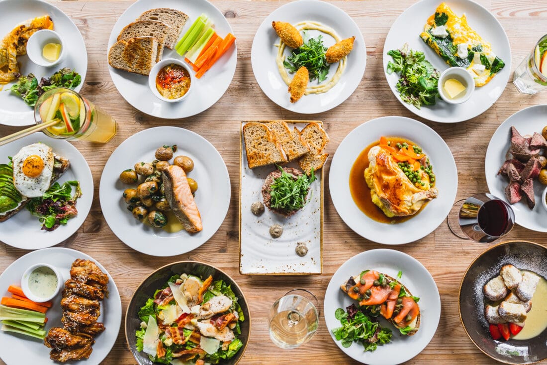  plates of brunch food at the farm best brunch prague