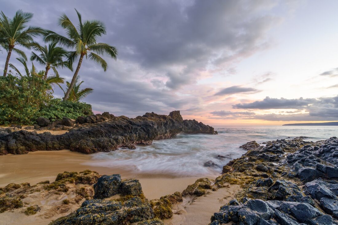 view of Secret Beach in Maui, hawaii, during a sunset