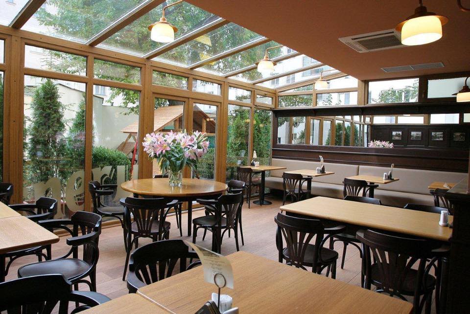 tables and bar in an empty restaurant in Prague