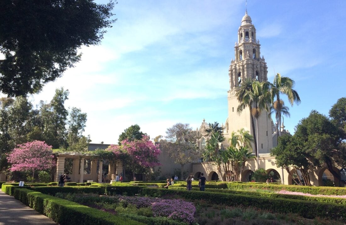 Trees, bushes, and the tower in Balboa Park, San Diego