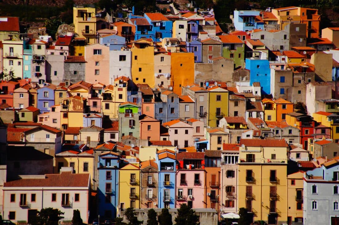 Colorful houses stacked in Bosa, Sardinia.