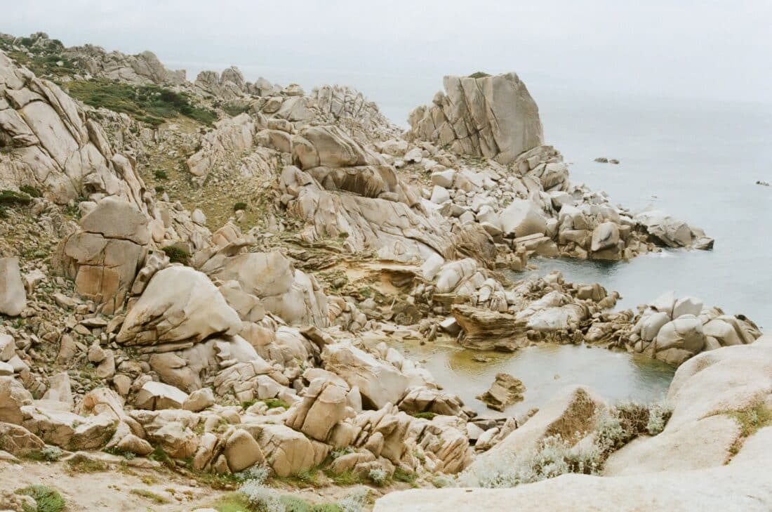 Rocky formations by the shore in valle della luna