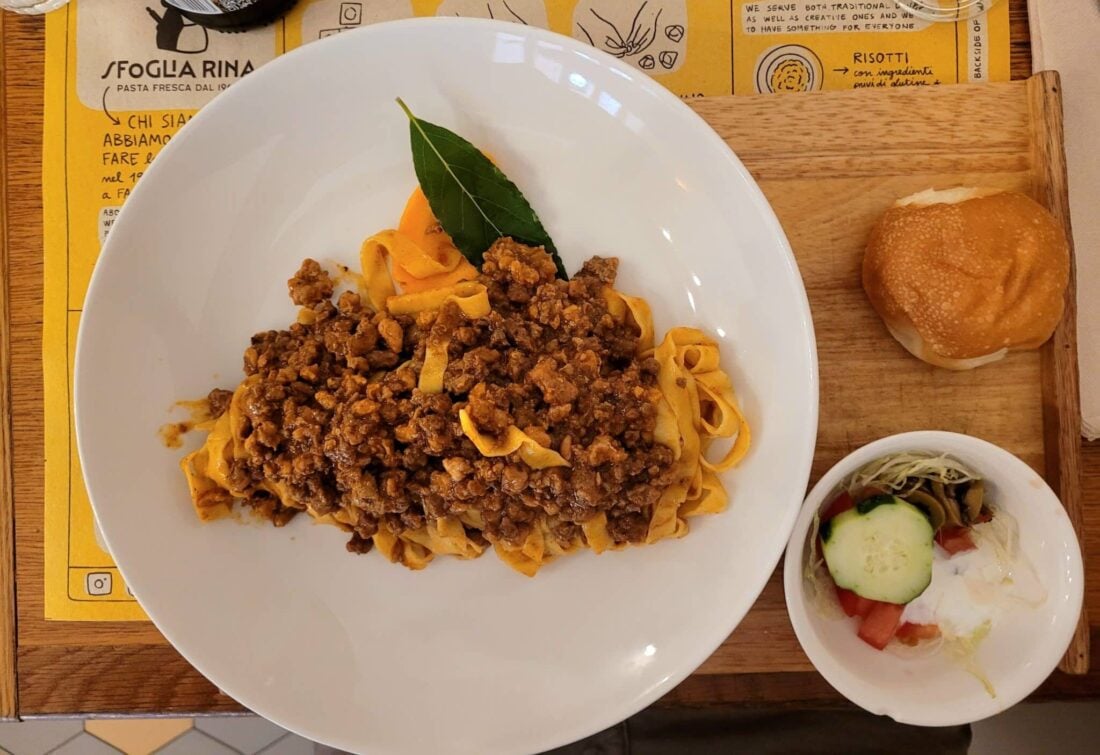 tagliatelle al ragu on a plate in bologna italy