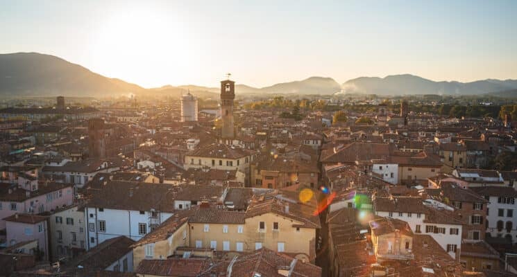 Lucca's rooftops during a sunset as seen from Guinigi Tower on an October afternoon.